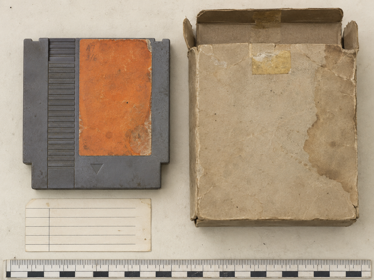 Unbranded worn cartridge, storage box, accession paper and measuring ruler